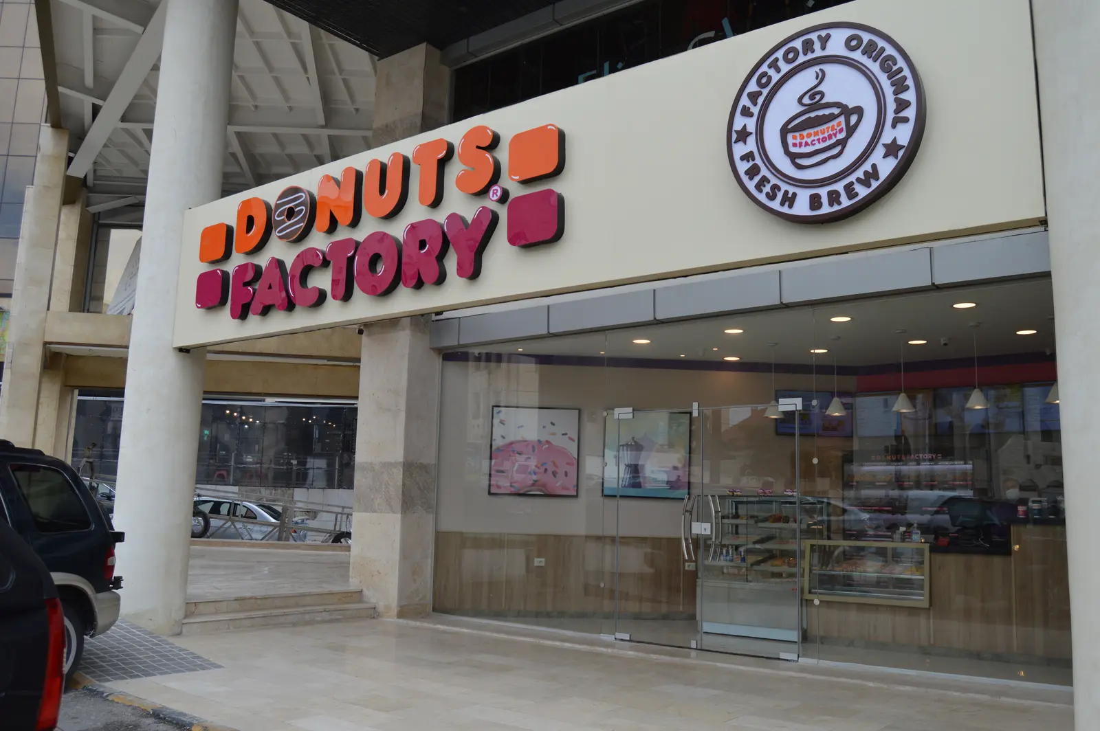 A Donuts Factory storefront in Jordan